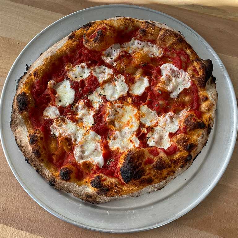 Margherita sourdough pizza with nice char