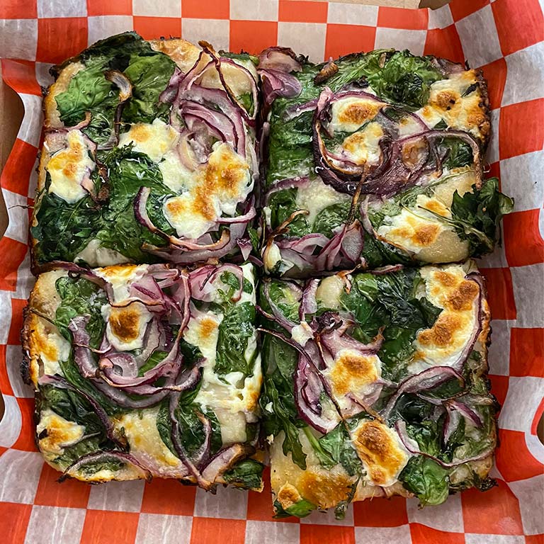 Garlic Cream, Greens, Red Onion and Mozzarella sliced in box